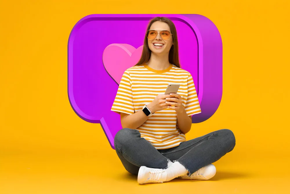 Smiling woman holding a phone
